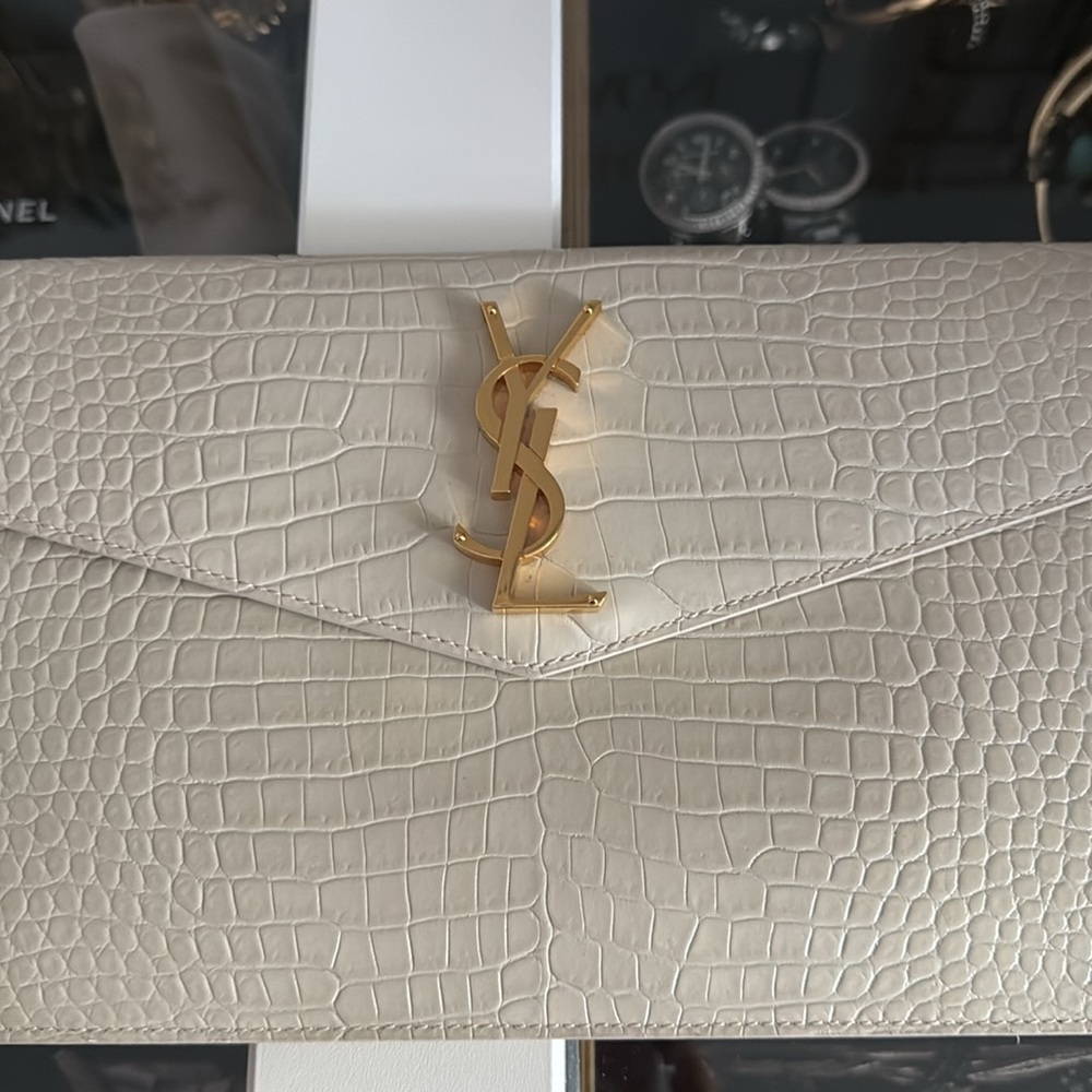 Saint Laurent YSL Cream Croc-Embossed Clutch
UPTOWN POUCH IN CROCODILE